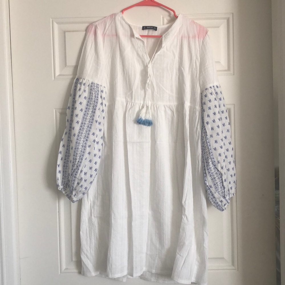 Absolutely beautiful white dress! Never worn!